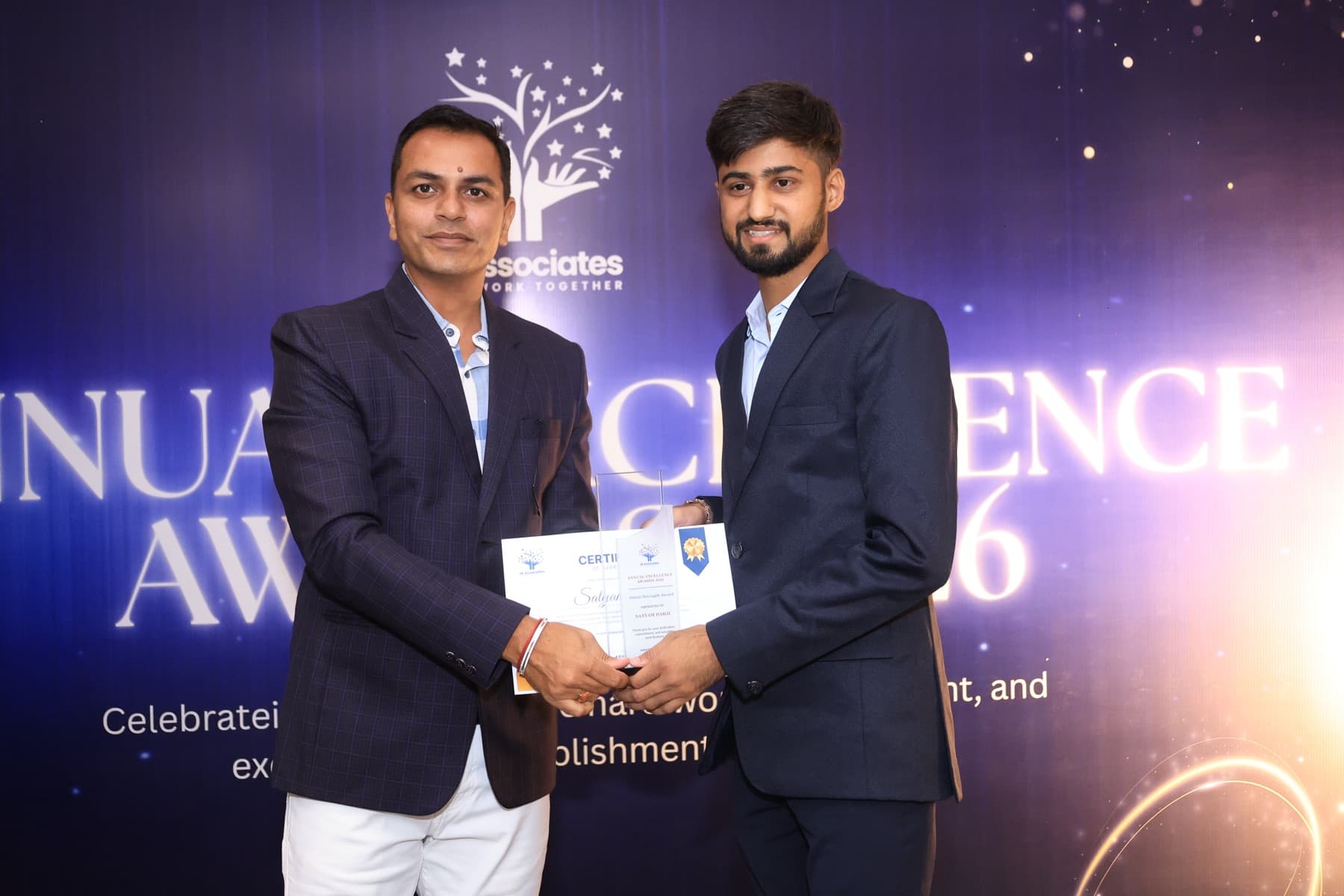 A team member receiving a certificate at the team trip awards