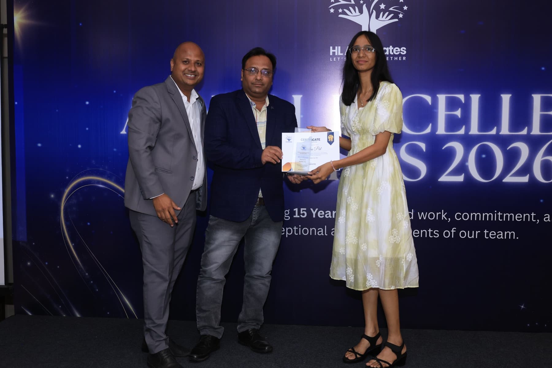 A team member receiving a certificate at the team trip awards