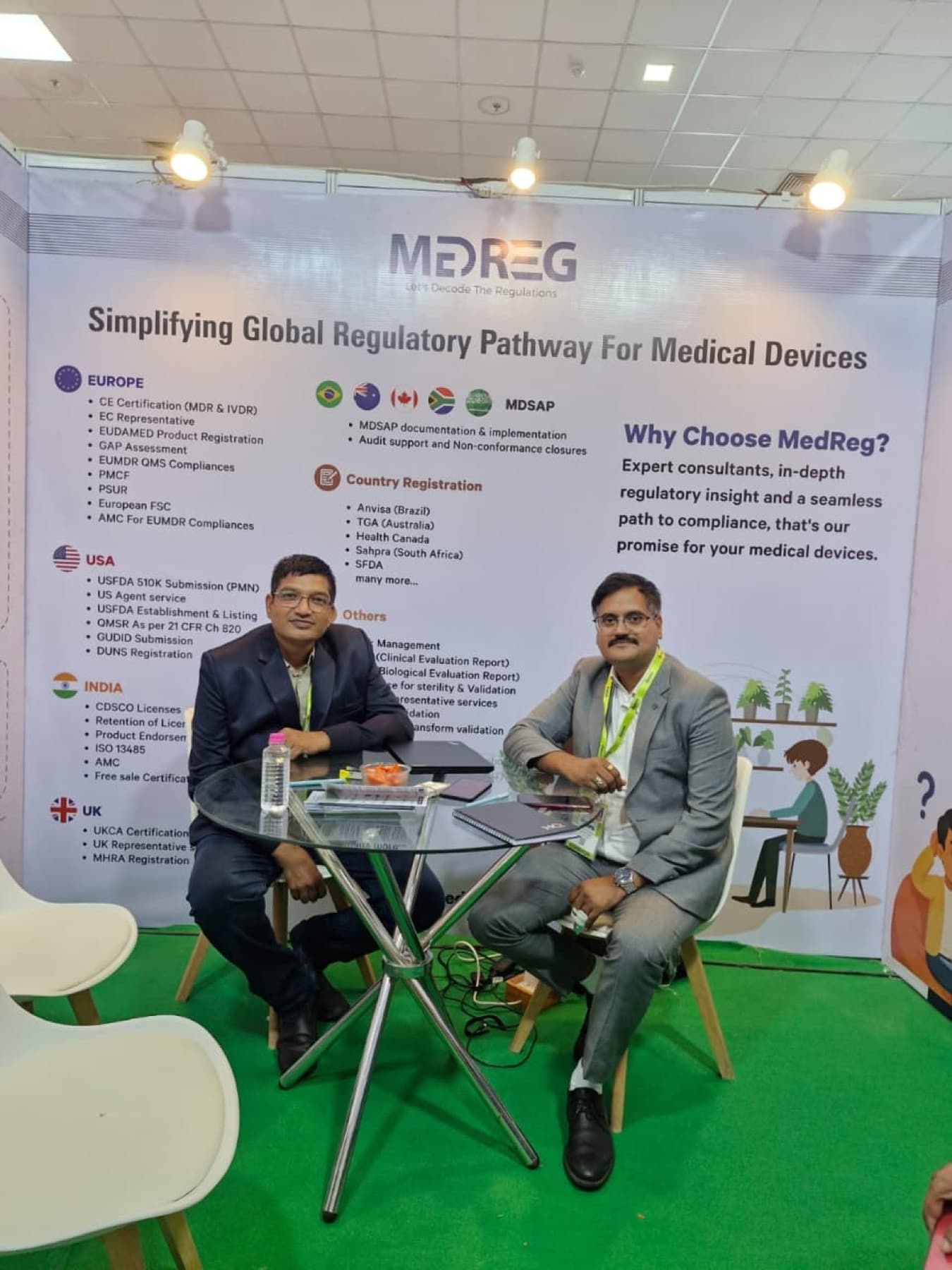 MedReg experts in a meeting at the MedReg exhibition stall
