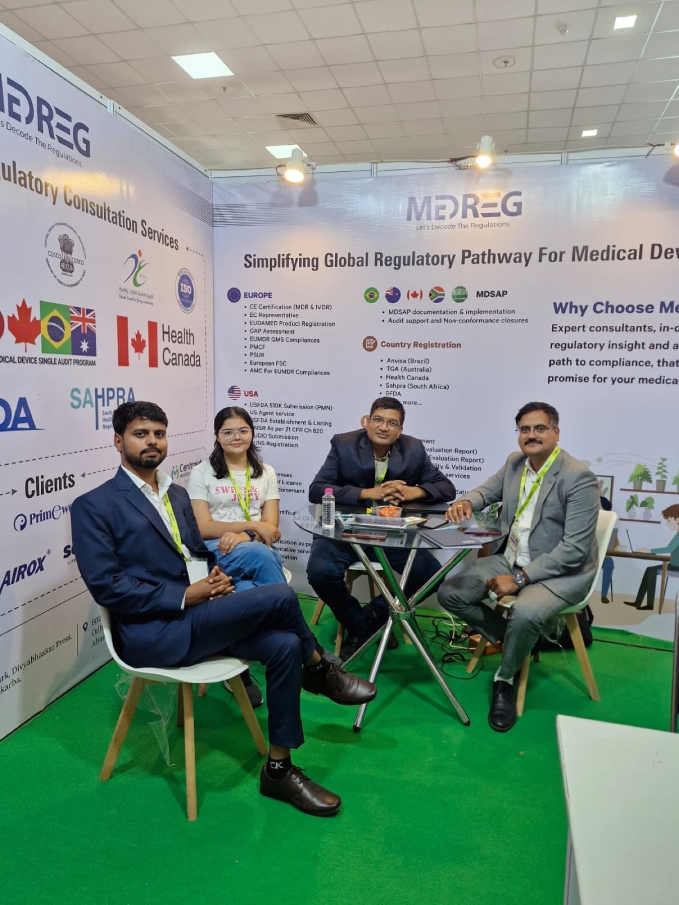 MedReg experts seated at the MedReg exhibition stall