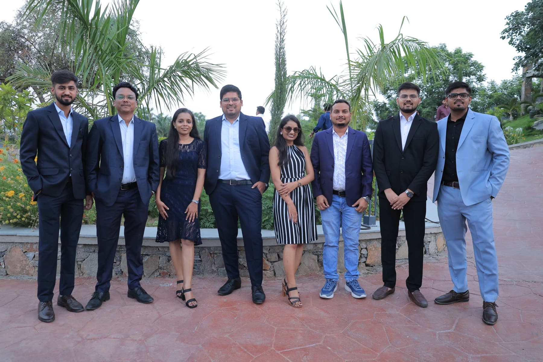 MedReg team members in formal wear on the team trip
