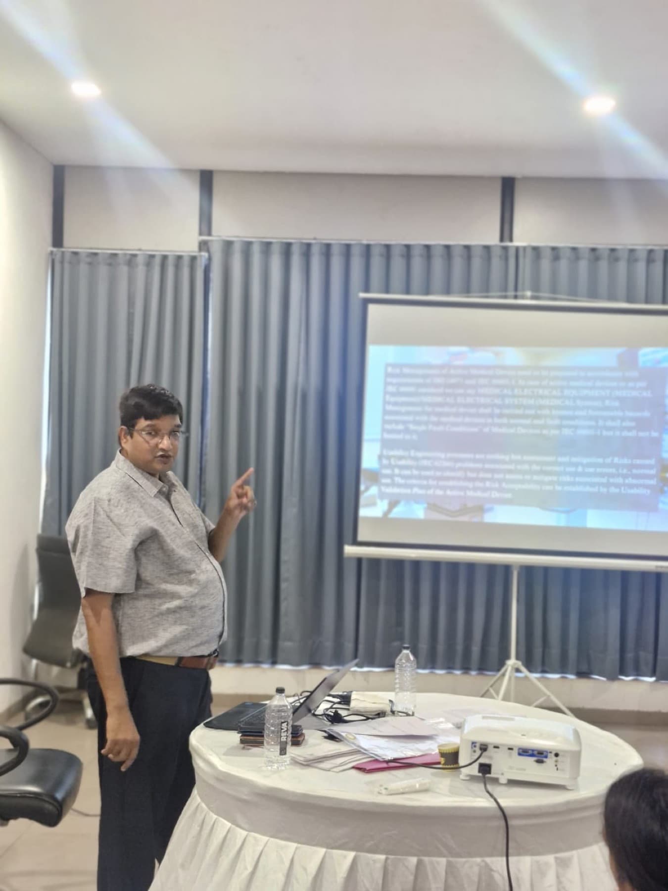 A trainer presenting slides at a training session
