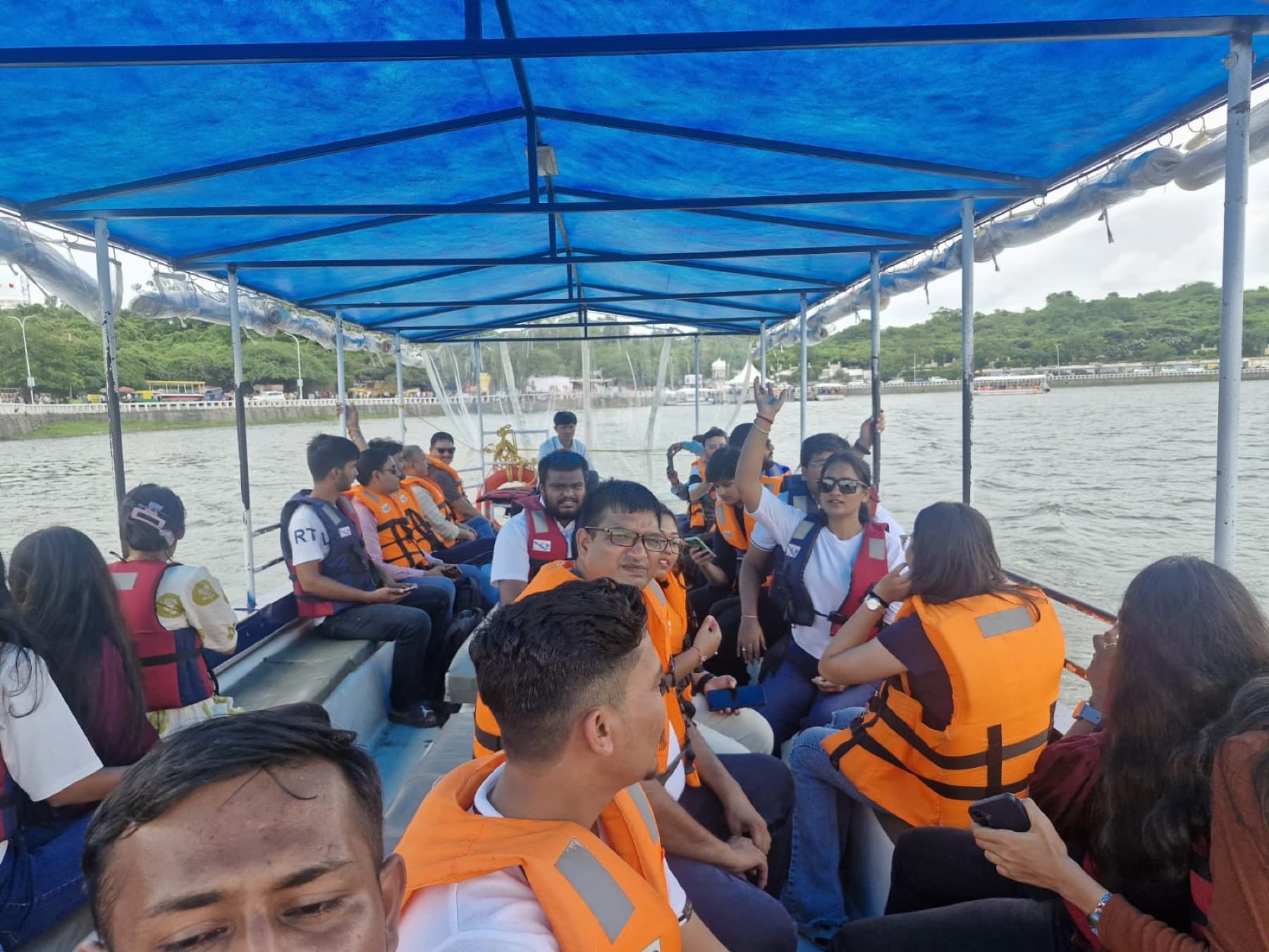 MedReg team members on a boat ride during a team trip